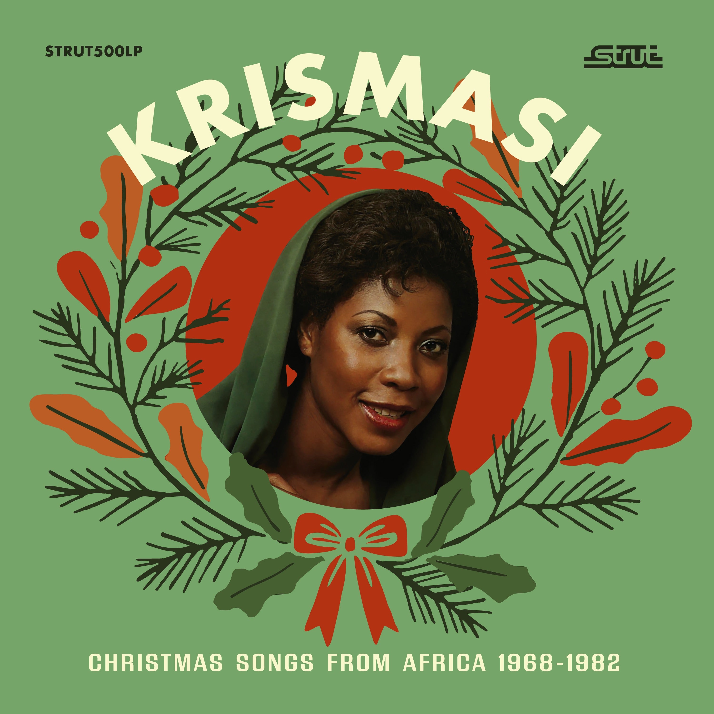 Album Cover of Various - Krismasi: Christmas Songs From Africa 1968-1982 (White/Red Inkplosion Vinyl) Vinyl LP on Strut